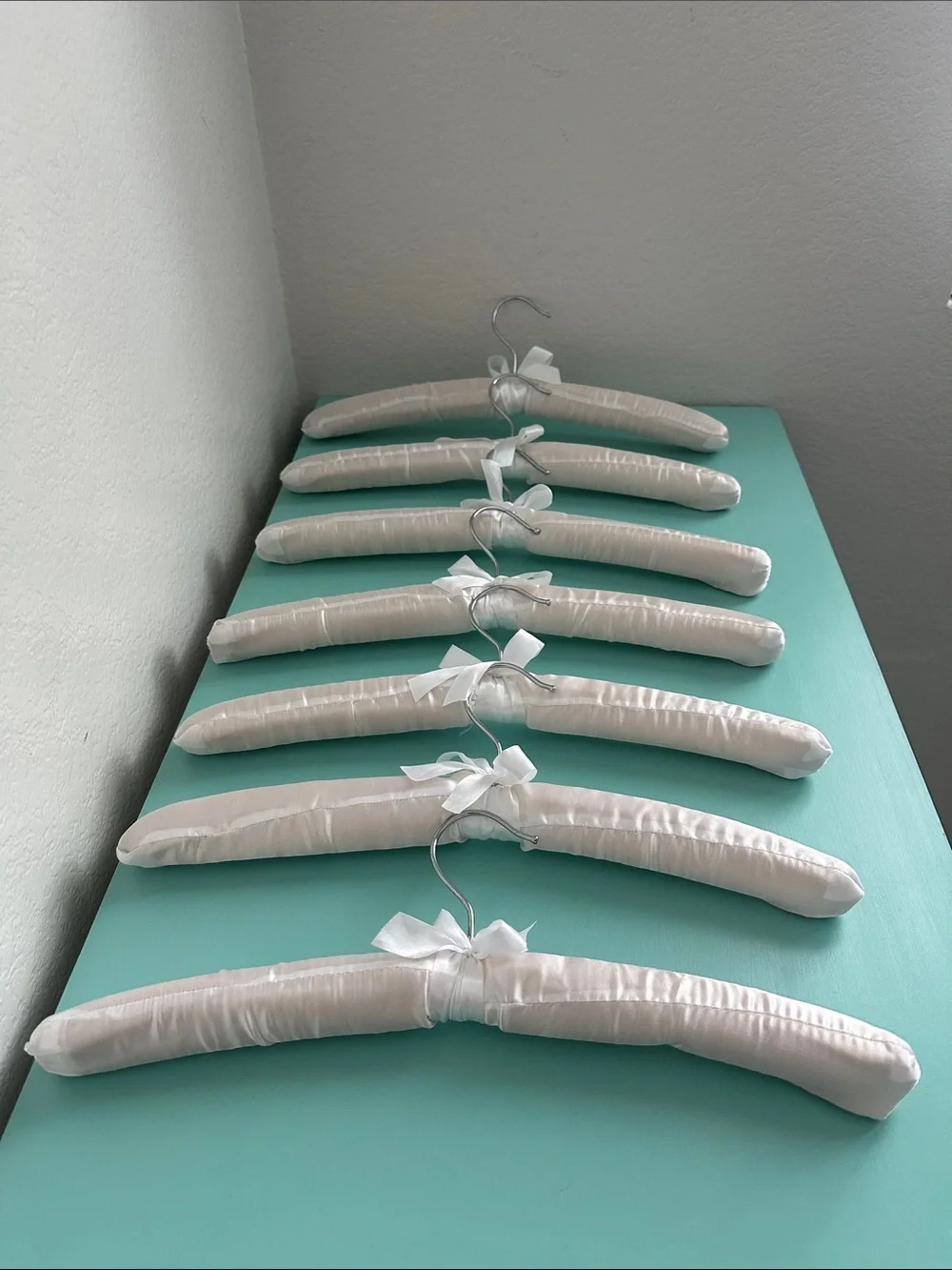 Satin white glossy padded heavy duty hangers-set of 7ct. with a bow-brand new